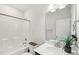 Clean bathroom featuring a shower/tub combination and a well-lit vanity with a modern faucet at 45 Pond Mountain Dr, Clayton, NC 27520