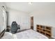 Bedroom featuring a window for natural light, carpet, and standard closet doors at 45 Pond Mountain Dr, Clayton, NC 27520