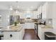 Well-lit kitchen featuring a center island, granite countertops, and stainless steel appliances at 45 Pond Mountain Dr, Clayton, NC 27520