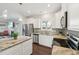 Bright kitchen showcasing granite countertops, stainless steel appliances, and ample cabinet space at 45 Pond Mountain Dr, Clayton, NC 27520