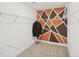 Walk-in closet with painted accent wall and wire shelving for optimal storage and organization at 45 Pond Mountain Dr, Clayton, NC 27520