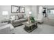 Comfortable living room featuring stylish furniture, decorative artwork, and a cozy atmosphere at 460 Grand Silo Rd, Garner, NC 27603