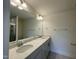 This bathroom features a double sink vanity and a glass-enclosed shower at 480 Traditions Grande Blvd # 31, Wake Forest, NC 27587