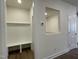 Entryway with bench, coat rack and pass-through to counter at 480 Traditions Grande Blvd # 31, Wake Forest, NC 27587