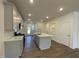 Bright kitchen with a center island, stainless steel appliances, and modern cabinetry at 480 Traditions Grande Blvd # 31, Wake Forest, NC 27587