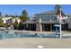 Community pool with clubhouse, providing a refreshing amenity for residents at 480 Traditions Grande Blvd # 31, Wake Forest, NC 27587