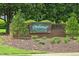 Community sign for Parkwood, a Key Homes Community, surrounded by lush landscaping at 5520 Mccormick Rd, Durham, NC 27713