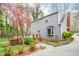 Charming house with meticulous landscaping, wood deck, and a well-manicured lawn at 5608 Ventura Dr, Durham, NC 27712