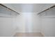 Walk-in closet with shelving for optimal storage, and neutral carpet at 5608 Ventura Dr, Durham, NC 27712
