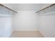 Walk-in closet with shelving for optimal storage, and neutral carpet at 5608 Ventura Dr, Durham, NC 27712