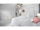 Bright main bedroom with neutral tones and view to a bathroom at 5608 Ventura Dr, Durham, NC 27712