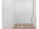 Walk-in closet with wire shelving and neutral carpet at 5980 Osprey Cove Dr, Raleigh, NC 27604