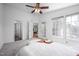 Spacious bedroom with ceiling fan and easy access to bathroom and sitting room at 6 Preakness Dr, Durham, NC 27713