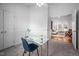 Light-filled room showing desk space and entry to living area with ample sunlight at 6 Preakness Dr, Durham, NC 27713