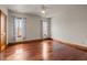 A simple bedroom with hardwood trim, hardwood floors and plenty of light at 6016 Glenthorne Dr, Raleigh, NC 27613