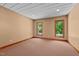 Neutral bedroom featuring natural light, carpet flooring, and a relaxing atmosphere at 6016 Glenthorne Dr, Raleigh, NC 27613