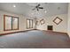 Large bonus room featuring a high ceiling, recessed lighting, ceiling fan, and large windows at 6016 Glenthorne Dr, Raleigh, NC 27613