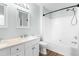 Bright bathroom with a double sink vanity, modern fixtures, and a shower-tub combination at 602 Walnut Woods Dr # 62, Morrisville, NC 27560