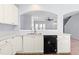 Open kitchen area featuring a stainless steel sink with view to living room at 602 Walnut Woods Dr # 62, Morrisville, NC 27560
