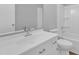 Clean bathroom featuring a white vanity, shower, and toilet at 612 Miller Rd, Hillsborough, NC 27278