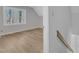 Bedroom featuring wood flooring and natural light from a window at 612 Miller Rd, Hillsborough, NC 27278