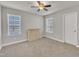 Bedroom featuring neutral walls, carpet flooring, and a ceiling fan at 640 Newlyn Dr, Raleigh, NC 27606