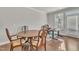 Dining area featuring wood flooring and neutral paint at 640 Newlyn Dr, Raleigh, NC 27606