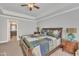 Cozy main bedroom with natural lighting and an entry to an en suite bathroom with dual vanity at 640 Newlyn Dr, Raleigh, NC 27606