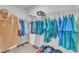 Walk-in closet with wire shelving, neutral walls and carpet flooring at 640 Newlyn Dr, Raleigh, NC 27606