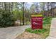 East Fork Mine Creek Trail sign amidst lush greenery, offering scenic walking and recreational opportunities at 6734 Chauncey Dr, Raleigh, NC 27615