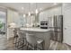 Modern kitchen featuring stainless steel appliances, granite countertops, and pendant lighting at 705 Marshall Farm St, Wake Forest, NC 27587