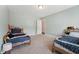 ' bedroom with two twin beds and light blue walls, creating a playful space at 834 November Ln, Willow Springs, NC 27592