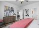 Bedroom with neutral walls, wood floors, and stylish decor and furnishings at 88 Baldwin St, Lillington, NC 27546