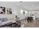 Spacious open-concept living room and kitchen with modern decor and hardwood floors at 88 Baldwin St, Lillington, NC 27546