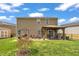 Spacious backyard with a gazebo, patio, and lush greenery, ideal for outdoor entertaining at 1000 Milkweed Ct, Zebulon, NC 27597