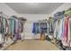 Spacious walk-in closet with ample storage and organizational features, ready for your wardrobe at 1000 Milkweed Ct, Zebulon, NC 27597