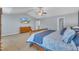 Comfortable main bedroom with vaulted ceiling, TV, and wooden dresser at 1000 Milkweed Ct, Zebulon, NC 27597