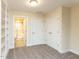 Bedroom with closet, carpeted floor, and connected bathroom with shower at 103 Thornwhistle Pl, Garner, NC 27529