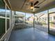 Screened porch with fan overlooking backyard at 103 Thornwhistle Pl, Garner, NC 27529