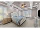 Inviting bedroom with coffered ceilings, plush carpet, and bright windows at 107 Zaharis Cv, Raleigh, NC 27603