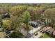 An aerial view of home featuring mature trees and landscaping at 1108 Medlin Dr, Cary, NC 27511