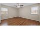 Bedroom featuring hardwood floors and natural light at 1108 Medlin Dr, Cary, NC 27511