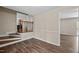 Entryway with hardwood floors and a railing into a dining room or living room at 1108 Medlin Dr, Cary, NC 27511