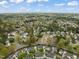 Neighborhood aerial view showcasing a beautiful layout with tree-lined streets and well-maintained homes at 1116 Silky Dogwood Trl, Apex, NC 27502