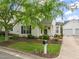 Charming home with manicured lawn, tidy flowerbeds, and a classic mailbox near the sidewalk at 1116 Silky Dogwood Trl, Apex, NC 27502