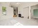 Spacious living room with fireplace, neutral walls, carpet, and natural light from the window at 1116 Silky Dogwood Trl, Apex, NC 27502