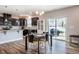 Open dining area next to the kitchen with a sliding glass door, perfect for indoor/outdoor dining at 112 Willow Grove Ln, Fuquay Varina, NC 27526