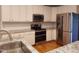 Well-equipped kitchen offers stainless steel appliances, granite counters, and ample cabinet space at 117 Linwood Ln, Clayton, NC 27527