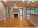 Spacious living room features hardwood floors, a fireplace, and seamless transitions to adjoining spaces at 117 Linwood Ln, Clayton, NC 27527