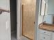 This bathroom features a shower with decorative etched-glass doors and a granite vanity at 117 Linwood Ln, Clayton, NC 27527